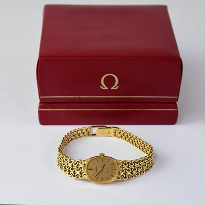 Lot 1302 - OMEGA; a ladies' 18ct yellow gold De Ville...