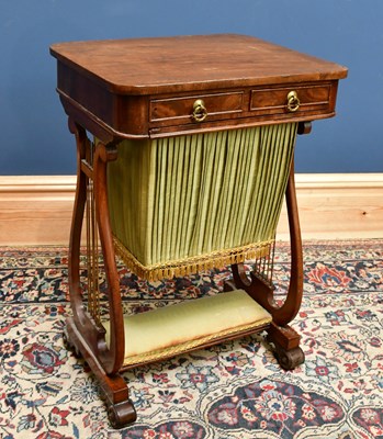 Lot 2458 - A Victorian walnut sewing table, with pull out...