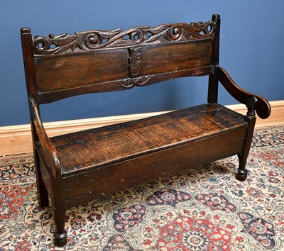 Lot 2404 - An 19th century carved oak settle, height...