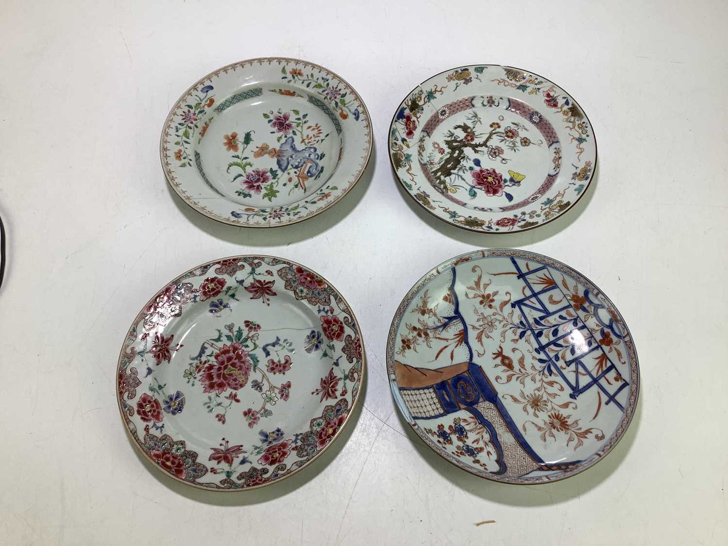 Lot 1115 - Four Chinese porcelain plates (af).