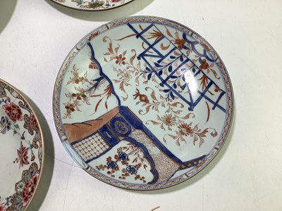 Lot 1115 - Four Chinese porcelain plates (af).