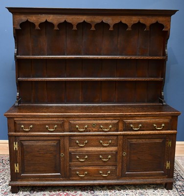 Lot 2514 - A 19th century oak dresser with plate rack...