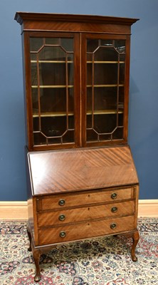 Lot 2465 - A 1920s walnut bureau bookcase, 207cm x 90cm x...