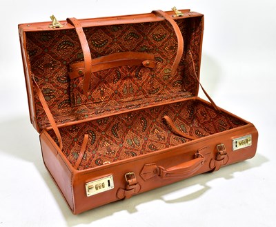 Lot 1033 - A tan leather suitcase, width 56cm, depth 30cm,...