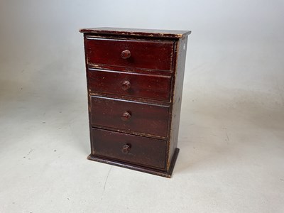 Lot 517 - A small apprentice piece, painted pine chest...