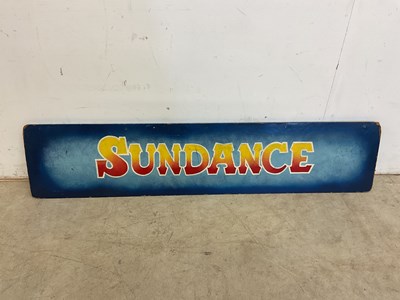 Lot 69 - A hand painted sign 'SUNDANCE' on hardboard,...