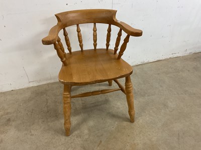 Lot 504 - A beech wood smoker's bow armchair, overall...