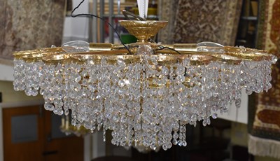 Lot 98 - A modern brass and cut glass ceiling light.