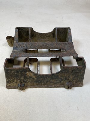 Lot 583 - A cast iron boot wiper by Exeter Waldron Co...