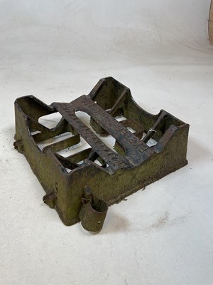 Lot 583 - A cast iron boot wiper by Exeter Waldron Co...