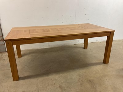 Lot 484 - A large oak dining table with two end drawers,...