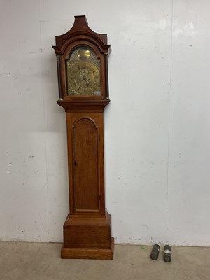 Lot 395 - A 19th century oak longcase clock with brass...