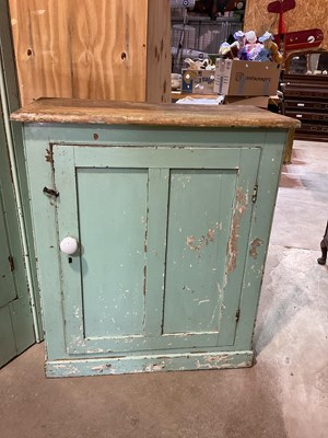 Lot 491 - Two green painted pine kitchen cupboards,...