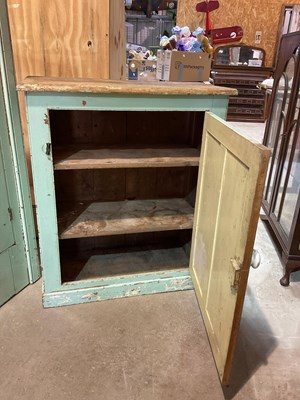 Lot 491 - Two green painted pine kitchen cupboards,...