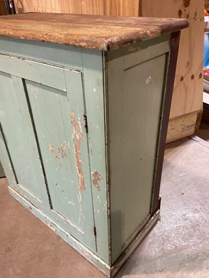 Lot 491 - Two green painted pine kitchen cupboards,...