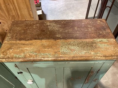 Lot 491 - Two green painted pine kitchen cupboards,...