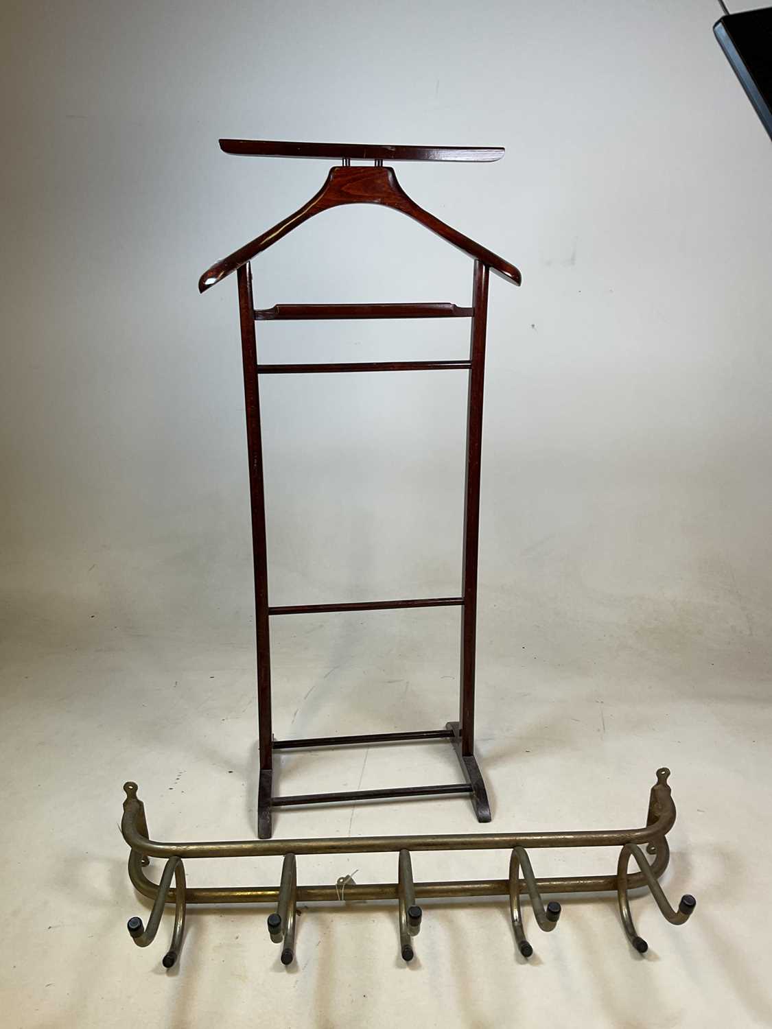 Lot 524 - A wooden freestanding valet suit stand, and a...