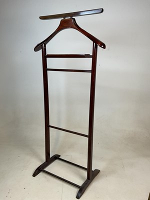 Lot 524 - A wooden freestanding valet suit stand, and a...