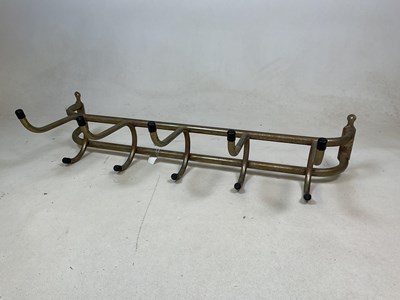 Lot 524 - A wooden freestanding valet suit stand, and a...