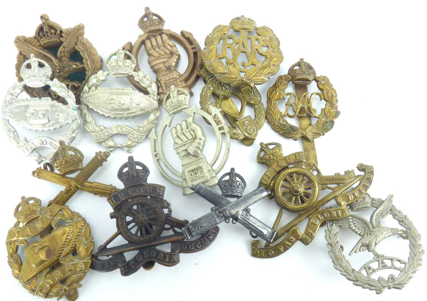 Lot 369 - Fourteen military cap badges to include