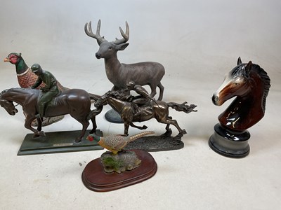 Lot 223 - Two bronze style horse sculptures, also a...