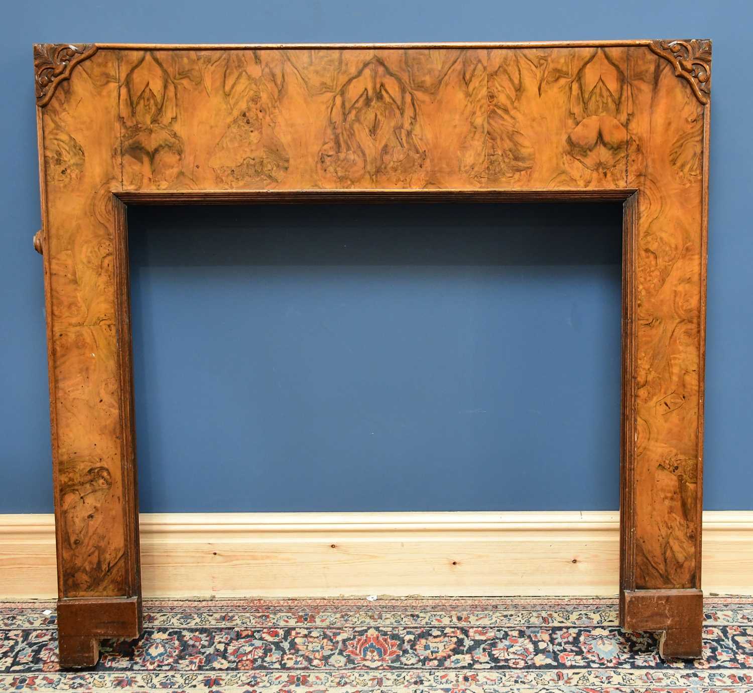 Lot 1626 - A 1940s walnut fire surround, height 136cm,...