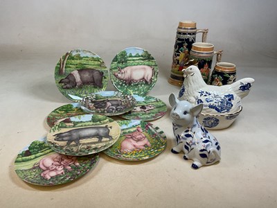 Lot 257 - A collection of mixed ceramics including three...