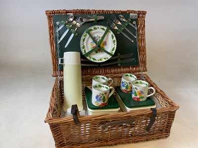 Lot 100 - A wicker picnic hamper, four settings, by Antler.