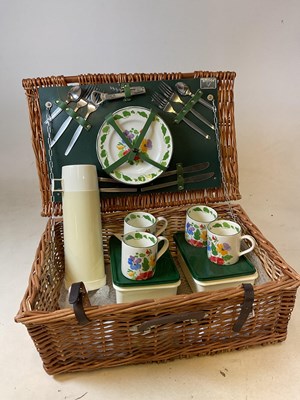 Lot 100 - A wicker picnic hamper, four settings, by Antler.