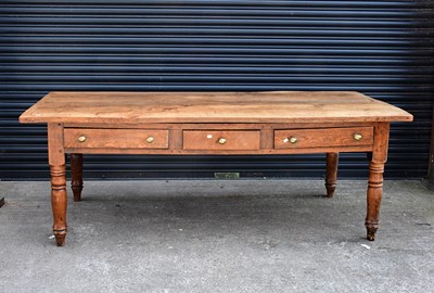 Lot 59 - A 19th century chestnut plank top table with...