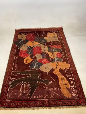 Lot 433 - An old Baluchi rug, 132cm x 86cm