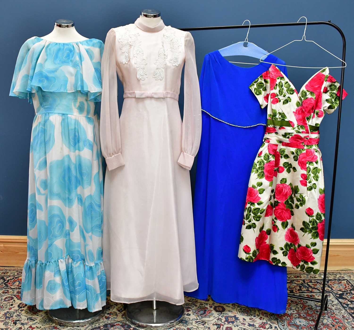 lot-759-four-vintage-circa-1970s-full-length-dresses