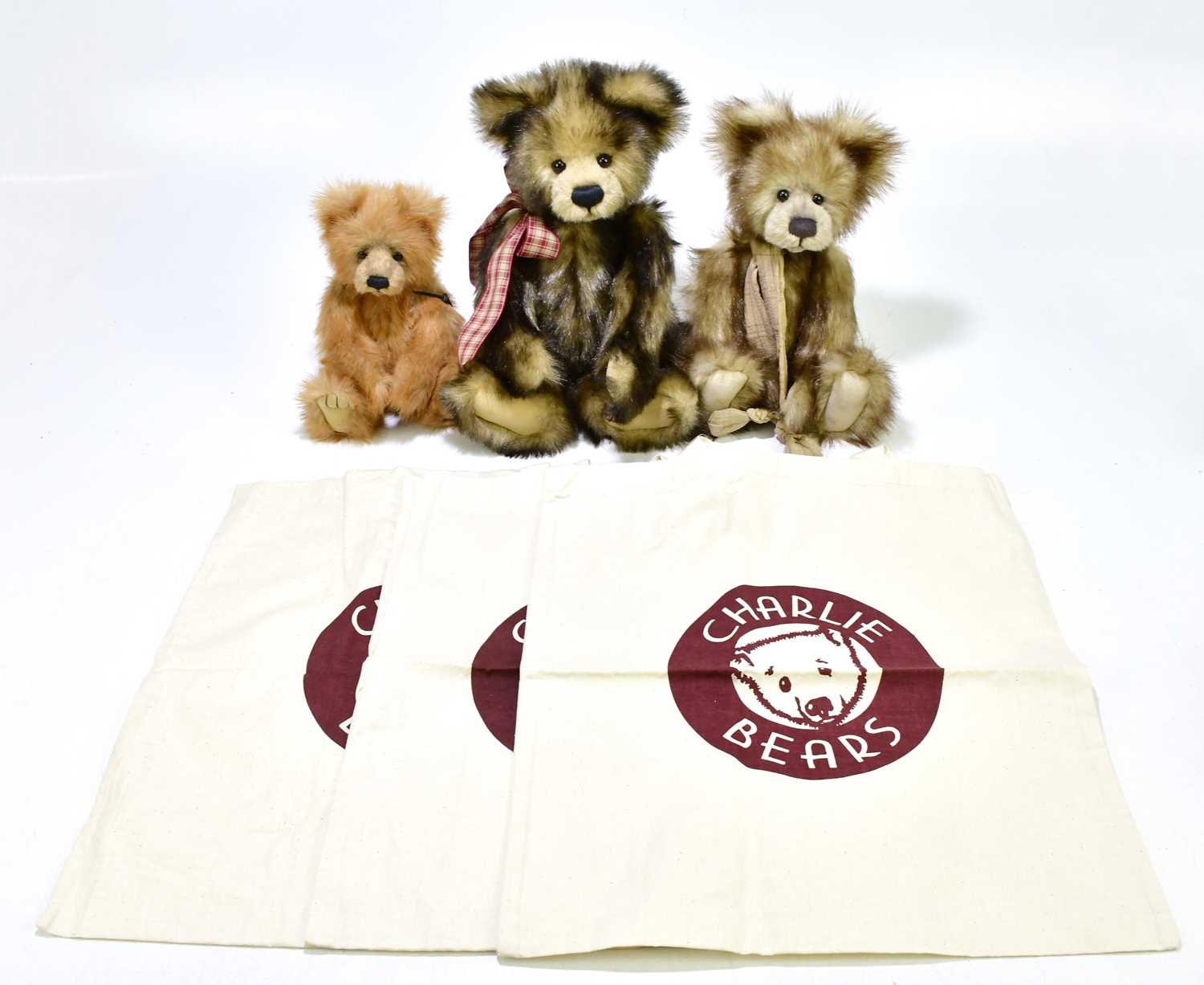 Lot 242 - CHARLIE BEARS; three teddy comprising 'Corey',...