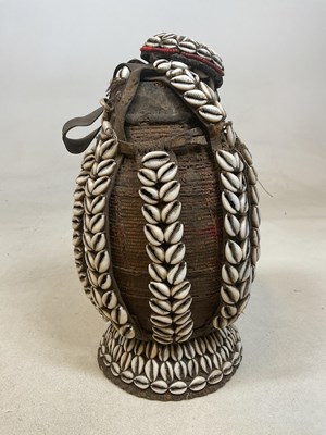 Lot 34 - An antique Ethiopian woven fibre milk...