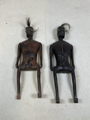 Lot 239 - A pair of African hardwood fertilty dolls,...