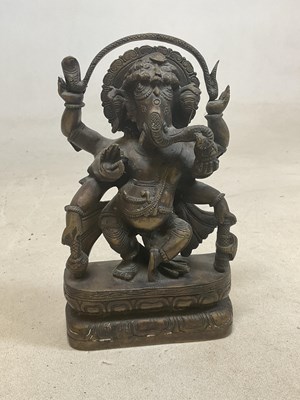 Lot 240 - An antique bronze Ganesh statue, height 24cm.