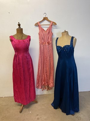 Lot 99 - A 1930s evening gown with two other mid...