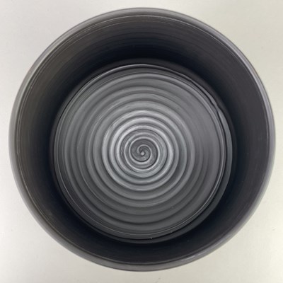 Lot 765 - TONY LAVERICK (born 1961); a black porcelain...