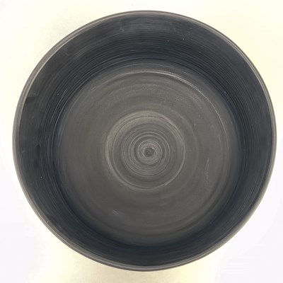 Lot 766 - TONY LAVERICK (born 1961); a black porcelain...