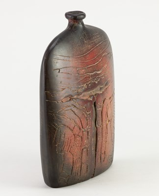 Lot 633 - PETER HAYES (born 1946); a raku bottle with...