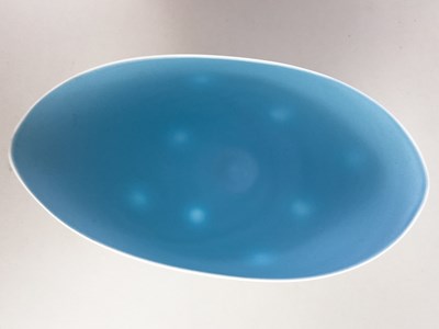 Lot 705 - SASHA WARDELL (born 1956); an oval slip cast...