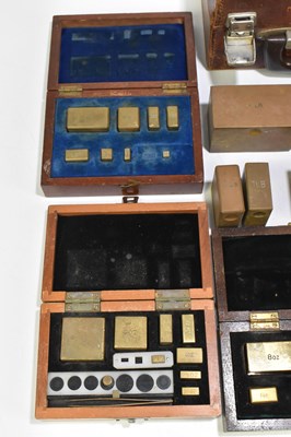 Lot 215 - A collection of part cased brass weights