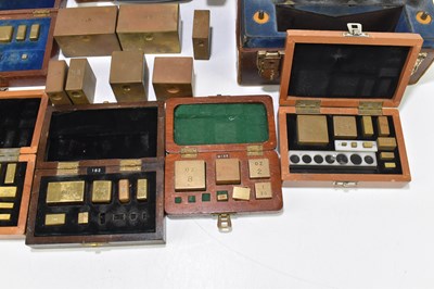 Lot 215 - A collection of part cased brass weights