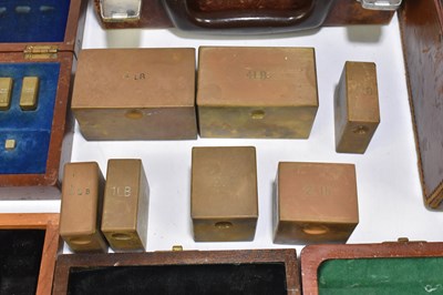 Lot 215 - A collection of part cased brass weights