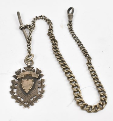 Lot 642 - A hallmarked silver watch chain with fob, 37.3g.