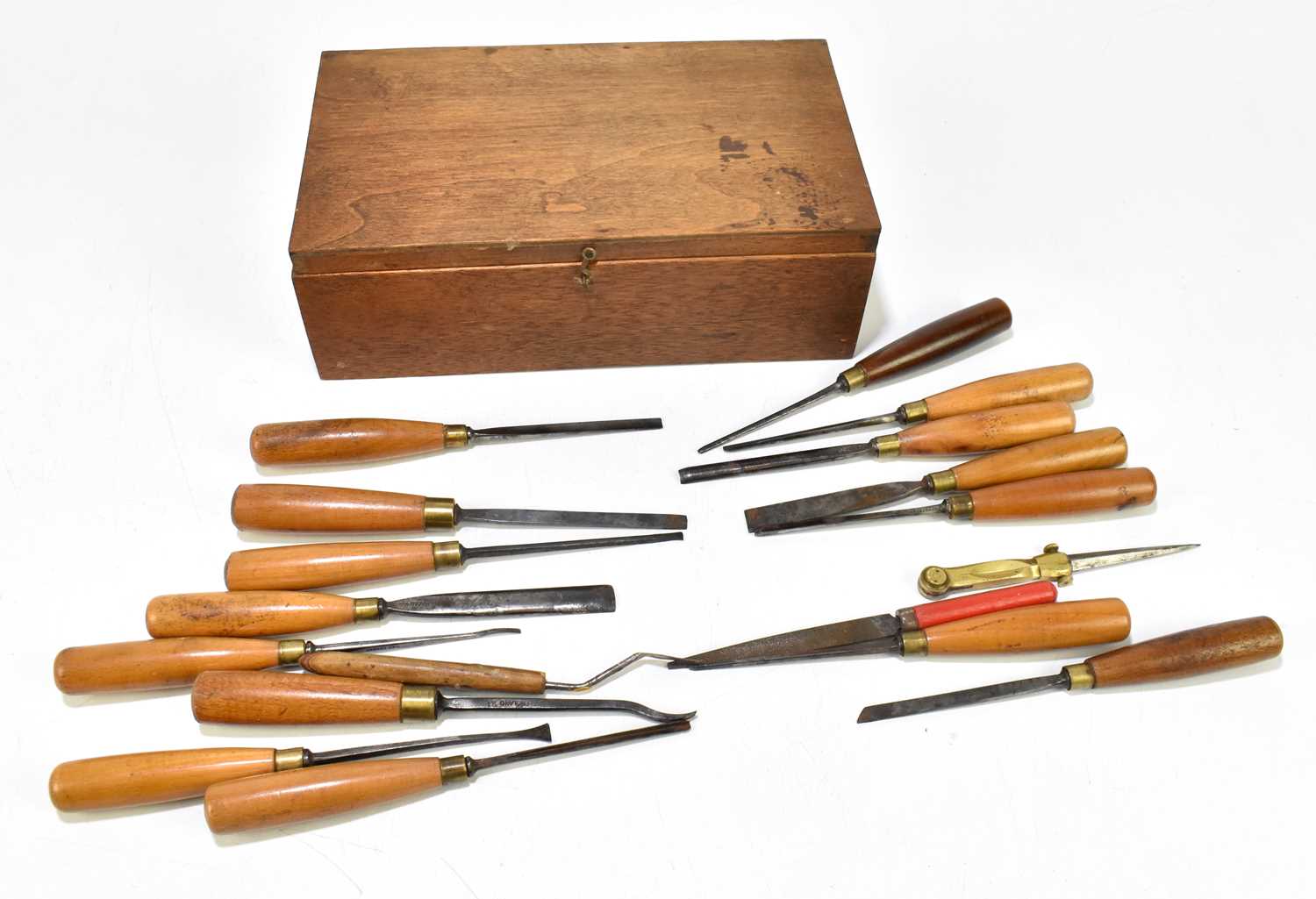 Lot 222 - A group of fourteen turned wooden handled chisels