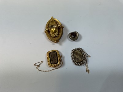 Lot 317 - Four 19th century mourning brooches including...