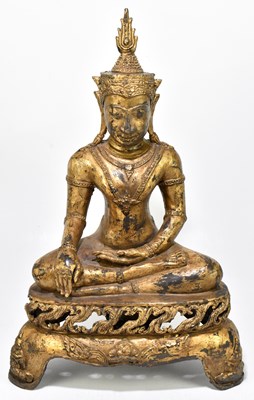 Lot 644 - A large 19th century cast gilt metal figure of a seated buddha