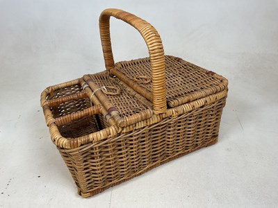 Lot 114 - A mid 20th century wicker picnic basket with...