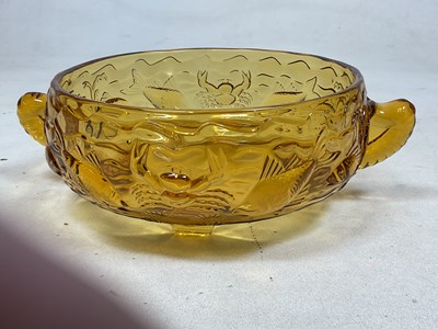 Lot 215 - BAGLEY GLASS; an amber coloured 'Marine' bowl...